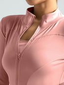 Jaqueta fitness feminina, blusa justa de secagem rápida, edição outono 2026, manga comprida com gola alta e proteção solar, ideal para Pilates e esportes.