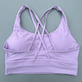 Top esportivo feminino de cor sólida com costas cruzadas macias, ideal para fitness, ioga e outras atividades físicas. Reforço de alta resistência e à prova de choque. Possui bojo para os seios.