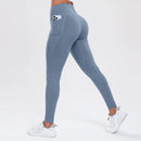 Calça legging esportiva feminina de ioga com bolsos, modeladora de bumbum e com controle abdominal, cintura alta, ideal para academia e atividades físicas.