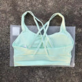 Top esportivo feminino de cor sólida com costas cruzadas macias, ideal para fitness, ioga e outras atividades físicas. Reforço de alta resistência e à prova de choque. Possui bojo para os seios.