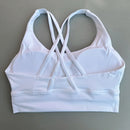 Top esportivo feminino de cor sólida com costas cruzadas macias, ideal para fitness, ioga e outras atividades físicas. Reforço de alta resistência e à prova de choque. Possui bojo para os seios.