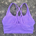 Top esportivo feminino de cor sólida com costas cruzadas macias, ideal para fitness, ioga e outras atividades físicas. Reforço de alta resistência e à prova de choque. Possui bojo para os seios.