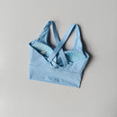 Sutiã esportivo feminino de alta intensidade e à prova de choque, tudo-em-um, para corrida, ioga e fitness. Top profissional para todas as estações.
