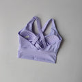 Sutiã esportivo feminino de alta intensidade e à prova de choque, tudo-em-um, para corrida, ioga e fitness. Top profissional para todas as estações.
