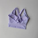 Sutiã esportivo feminino de alta intensidade e à prova de choque, tudo-em-um, para corrida, ioga e fitness. Top profissional para todas as estações.